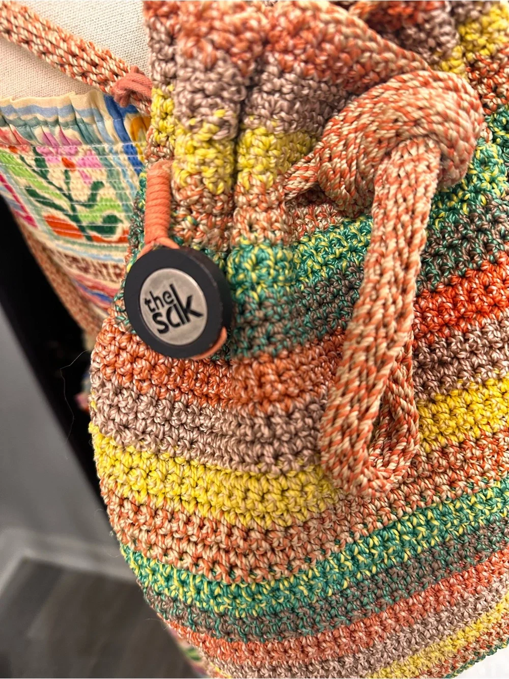The Sak Crochet Striped Drawstring Bucket Bag Crossbody Boho
